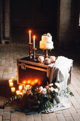 decorated table with flowers and candles in the loft style room