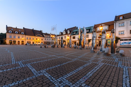 Central square in Zory after sunset.