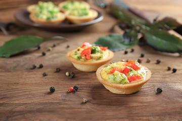 Broccoli quiche tartlets on table