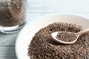 Chia seeds and spoon on plate