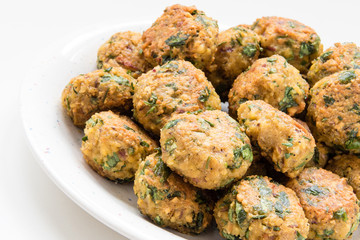 falafel balls on plate on white background. closeup