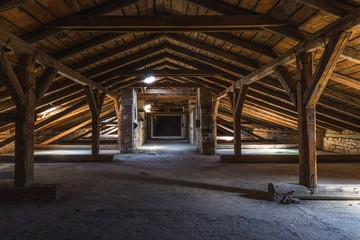 Creepy attic interior at abandoned building