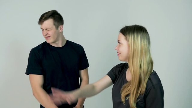 Slap in the face. Relationship difficulties young woman having an argument with her boyfriend, slow motion