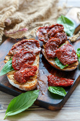 Homemade bread grilled with sun dried tomatoes.
