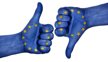  Hand with thumb up and down with the EU flag painted.  Symbol of positivity and crisis in european union. - obrazy, fototapety, plakaty