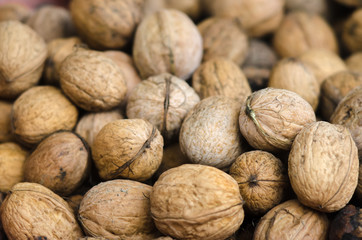 Walnuts background. Group walnuts. Healthy organic food concept.