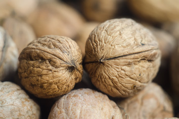 Walnuts background. Group walnuts. Healthy organic food concept.