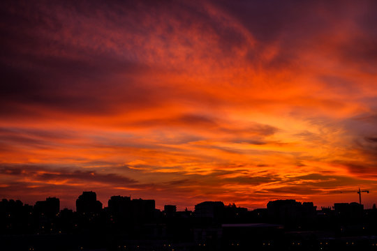 Spectacular sunset over Belgrade with orange clouds