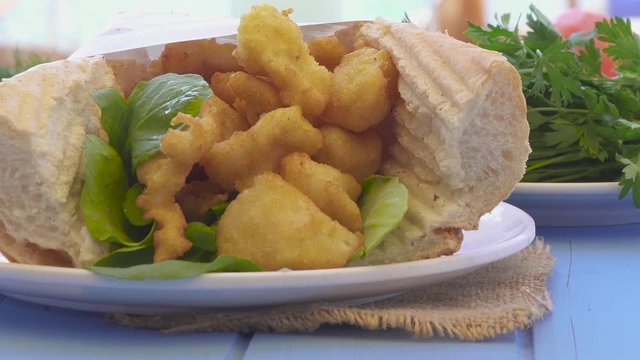 Istanbul fast-food, grilled fish burger sandwich.