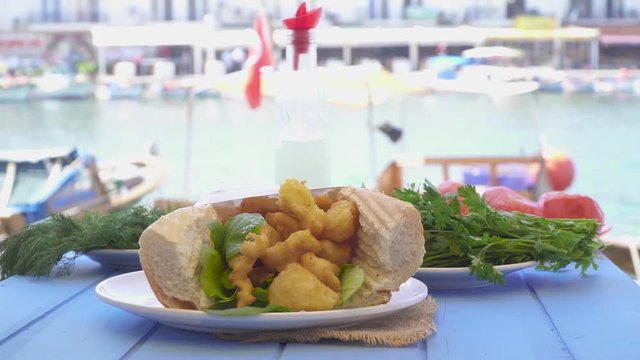 Fast food, grilled fish burger sandwich. Izmir Foca Turkey.