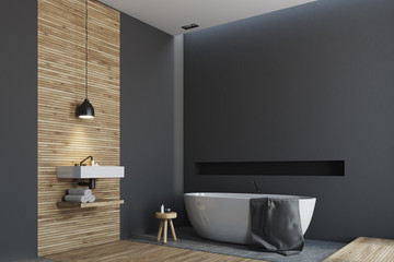 Fototapeta na wymiar Wooden and black bathroom, round tub side