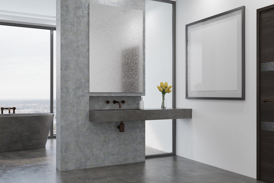 Concrete bathroom, gray tub and sink side