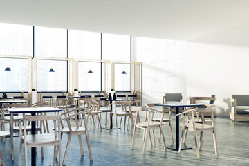 Loft cafe black tables, wooden chairs, corner