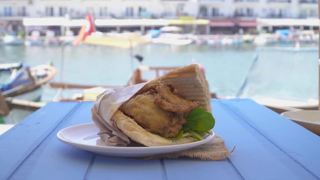 Fast food, grilled fish burger sandwich. Izmir Foca Turkey.
