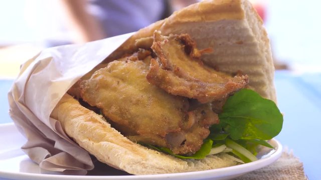 Istanbul fast-food, grilled fish burger sandwich.