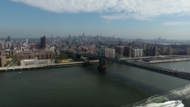 NEW YORK CITY SKYLINE MANHATTAN BRIDGE EAST RIVER AERIAL 4K