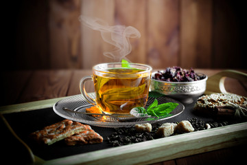 Tea in a cup on an old background