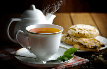 Tea in a cup on an old background