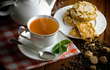 Tea in a cup on an old background