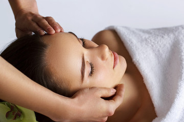 Portrait of Young Beautiful Woman in Spa Salon.Spa Body Massage Treatment and Skincare.Leisure.