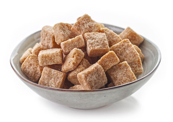 Bowl of brown sugar cubes