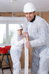 two carpenters working at location