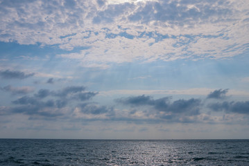 the photograph of the sky against the sea