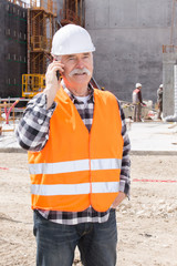 Obraz na płótnie Canvas engineer builder at construction site