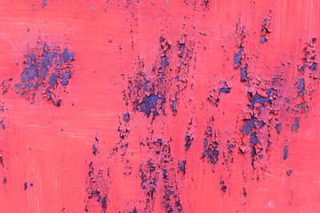 Old metal red painted background with streaks of rust for creativity, textures and backgrounds.