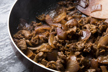 Fried mutton with onion