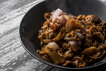 Fried mutton with onion