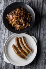 Fried mutton with onion and  Fried sausage