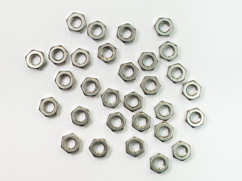 screw and nuts on white background