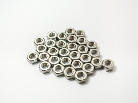 screw and nuts on white background