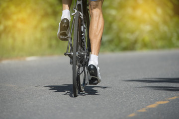 Closeup cycling on road © chamnan phanthong