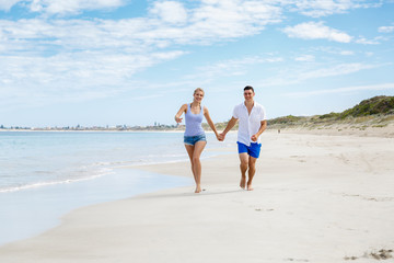 Romantic young couple on the beach