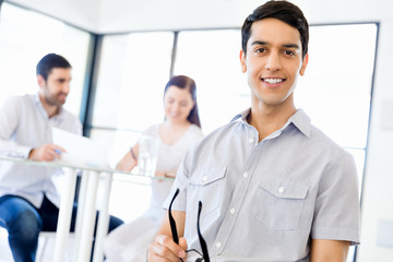 Young man in casual in office
