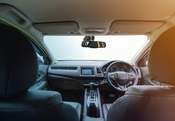 Fototapeta premium Interior of modern car with isolated windshield front for driving concept