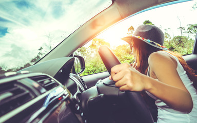 Naklejka premium Asian women travel relax in the holiday. drive a car