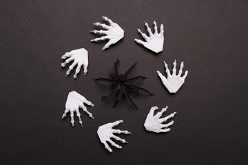 Black Halloween Background with White Skeleton Hands