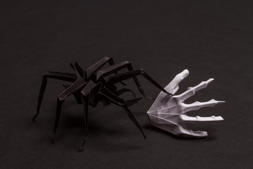 Black Halloween Background with White Skeleton Hands