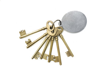 golden old golden keys on white background
