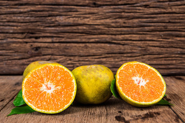 Orange  from above on wood table.