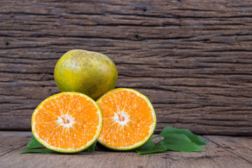 Orange  from above on wood table.
