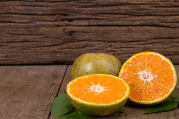 Orange  from above on wood table.