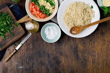 Ingredients for cooking vegetarian salad with porridge bulgur and vegetables