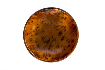 Wooden bowl on white background