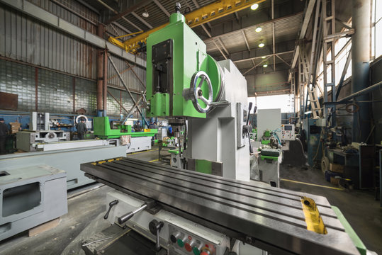 Working table of a new vertical milling machine. - Powered by Adobe