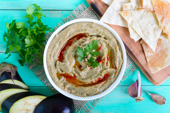 Baba ganush - hummus from eggplant with seasoning, parsley. Eastern cuisine.