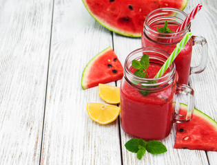 Jars with watermelon smoothie
